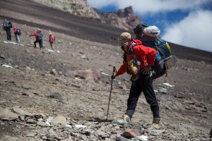 maximo-kausch-carrying-equipment-to-c1